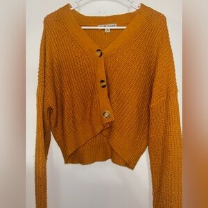 Orange button up sweater